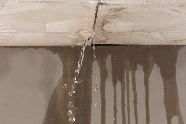 Professional Flood Damage Cleanup technician working in West New York, NJ